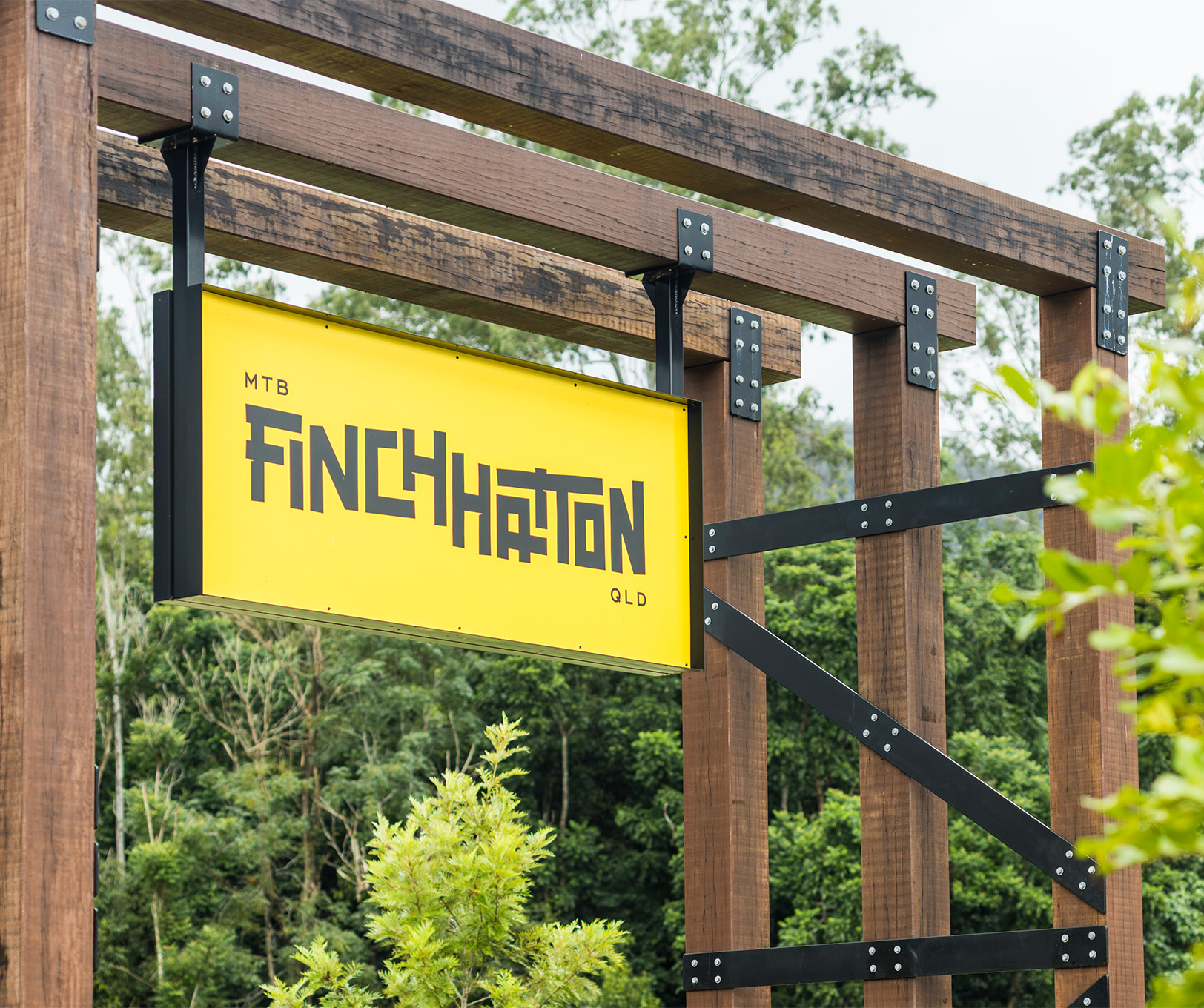 The form of the wayfinding takes cues from local and historic design inspiration, seen here in the metal cross bars