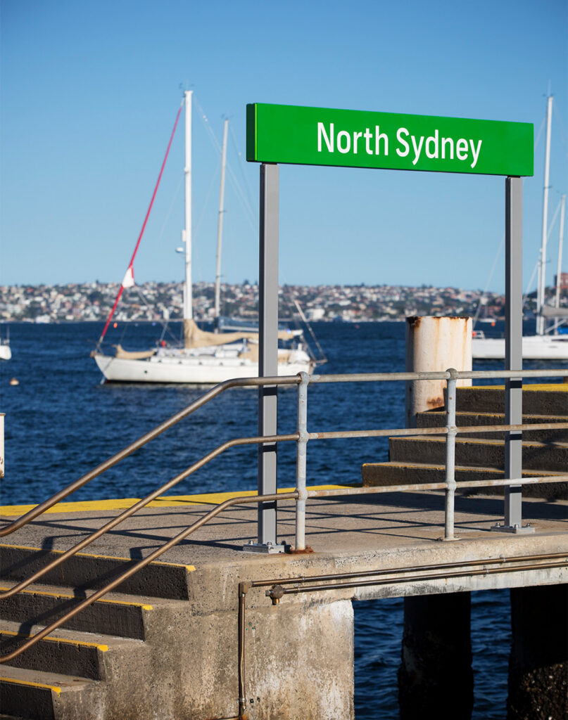 Ferry wayfinding signage is green to align to the identity of the ferry network