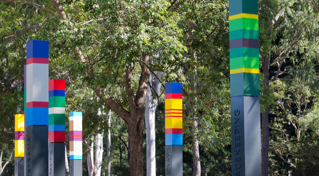 The tops of the placemaking totems are inspired by military medals