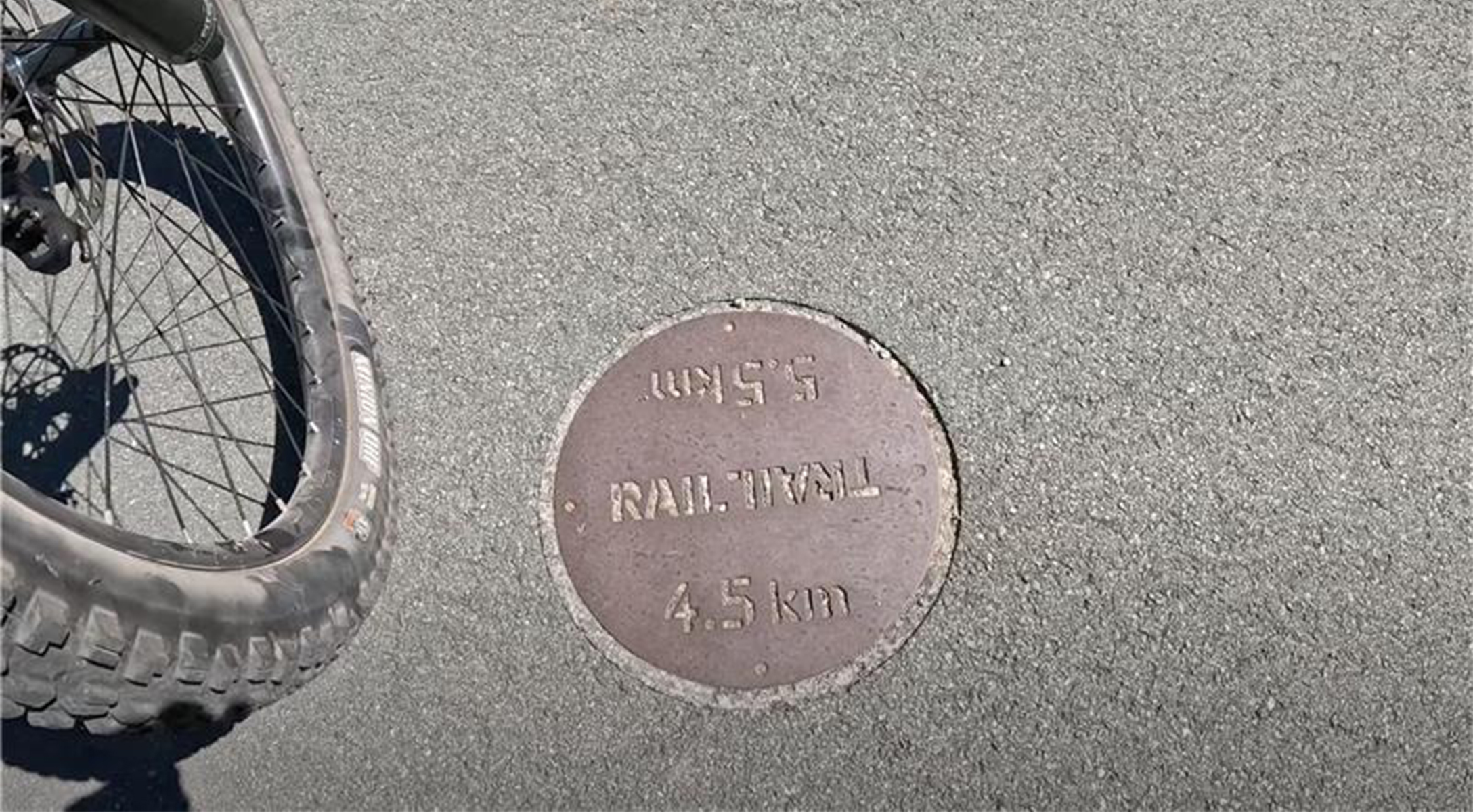 Trail distance markers embedded into the floor