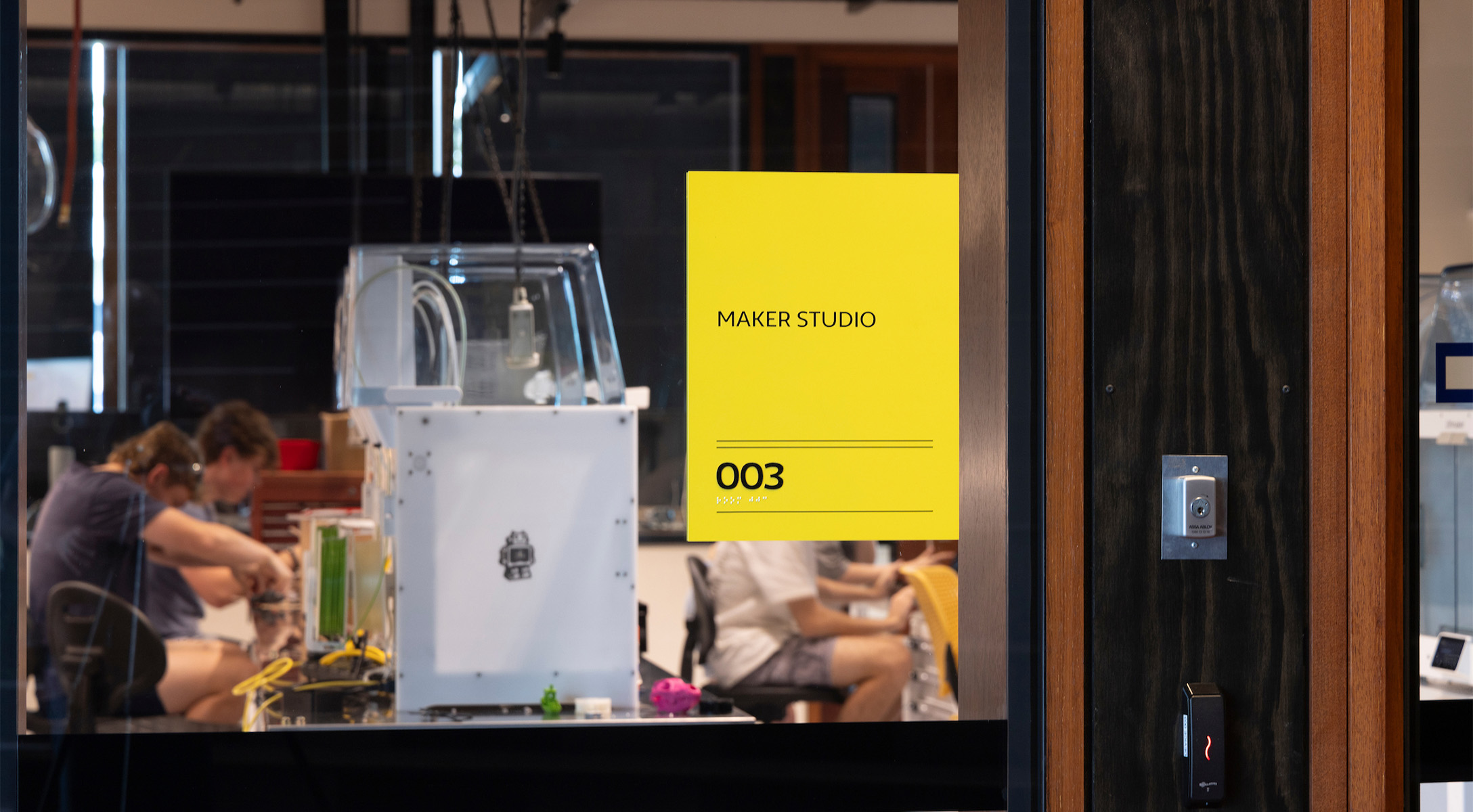 Wayfinding stands out in the context of the architecture creating clear navigational cues